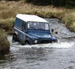 A Southern Electric Land Rover 130 on a training course